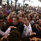 Guaido announced his return on Twitter before being greeted by a throng of cheering supporters at the Caracas international airport
