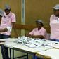 Polling officers verify ballots at a counting centre in the Ledumang Senior Secondary school for the Gaborone North constituency, in Gaborone on October 23, 2019