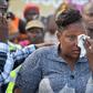 An emotional Rose Mueni after learning of her husband's death