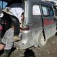 Casualties are loaded into an ambulance  following an air strike by pro-regime forces in the nothwestern Syrian city of Idlib on Saturday