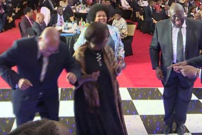 File image of President Uhuru Kenyatta dancing with other dignitaries