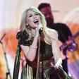 Pop star Kylie Minogue and other famous Australians appear in the tourism ad