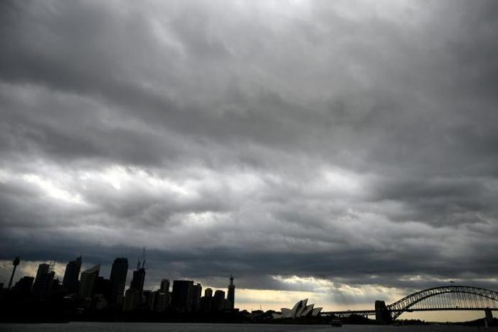 Storm clouds over Sydney Harbour gave some relief  after weeks of intense bushfires