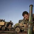 A French soldier of the French Army adjusts the coordinates of a mortar at a temporary base in northern Burkina Faso in November 2019