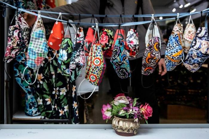Colourful masks on sale at a shop in Hong Kong, where residents are having to be inventive because of a shortage of recommended supplies