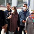 Some Iranians have begun wearing face masks amid a deadly coronavirus outbreak