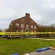 Police tape cordons off an area after a shooting at the Pensacola Naval Air Station in December 2019