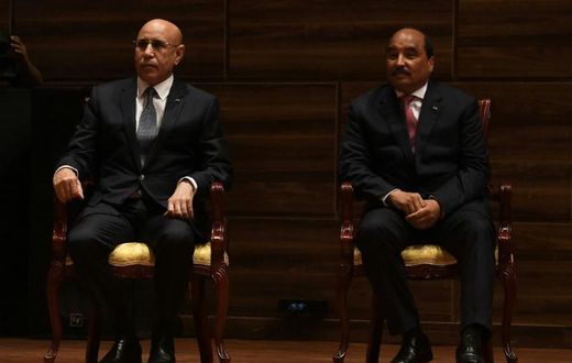 Former president Mohamed Ould Abdel Aziz, right, and his successor, Mohamed Ould Cheikh El Ghazouani