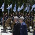Cuban President Miguel Diaz-Canel (L) takes part in a wreath-laying ceremony to pay homage to Argentine national hero General Jose de San Martin, at San Martin Square in Buenos Aires on Monday