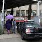 A police car enters the prosecutor's office in Beirut where fugitive former auto magnate Carlos Ghosn was summoned for questioning
