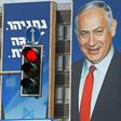 An Israeli election banner pictured in September 2019 bears the portraits of US President Donald Trump (L) and Prime Minister Benjamin Netanyahu hanging on a building facade in Jerusalem