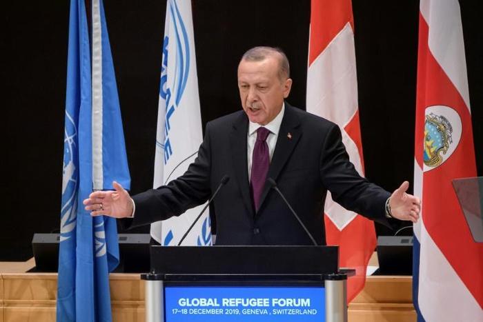 Tens of thousands of Syrians have fled towards the Turkish border following heightened regime and Russian bombardment of the Maaret al-Numan region since December 16; pictured is Turkey's President Recep Tayyip Erdogan
