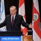 Tens of thousands of Syrians have fled towards the Turkish border following heightened regime and Russian bombardment of the Maaret al-Numan region since December 16; pictured is Turkey's President Recep Tayyip Erdogan