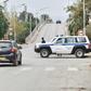 Police cars block access to a road near a courthouse in the Algerian city of Blida where the appeal hearing was held