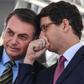 Brazilian President Jair Bolsonaro (L), with his Environment Minister Ricardo Salles in October 2019, has been widely criticized for easing restrictions on exploiting the Amazon's vast riches, leading to an acceleration in deforestation