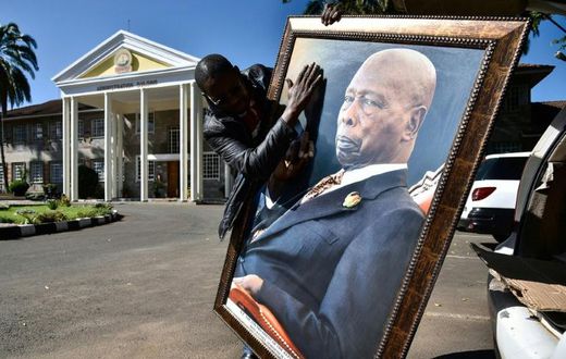 Daniel arap Moi, who towered over Kenya between 1978 and 2002, lay in state for three days in parliament, with tens of thousands of people filing past to pay their respects
