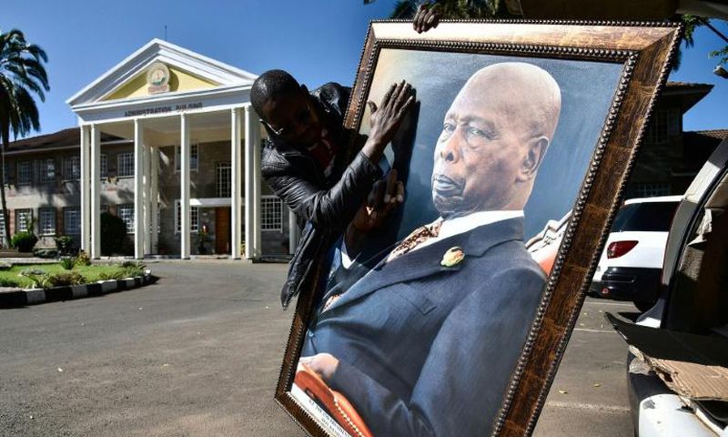 Daniel arap Moi, who towered over Kenya between 1978 and 2002, lay in state for three days in parliament, with tens of thousands of people filing past to pay their respects