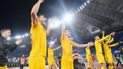 Roman conquerors: Celtic players celebrate a 2-1 win over Lazio in the Italian capital