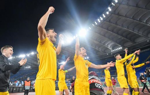 Roman conquerors: Celtic players celebrate a 2-1 win over Lazio in the Italian capital