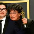 "Parasite" writers Han Jin-won and Bong Joon-ho (R) have secured a historic Oscars win a year after the 100th anniversary of South Korean cinema in 2019
