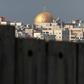 Jerusalem's iconic Dome of the Rock can be seen from Abu Dis -- but Israel's controversial barrier is in the way