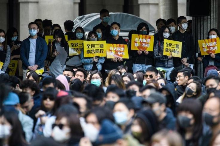 A rally by workers from the advertising sector this week. Violence has lessened in Hong Kong protests following recent local elections