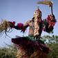 Defiance: A masked man wearing a traditional Dogon costume dances at the opening of the Segou'Art Festival, which takes place despite the threat of jihadist attacks