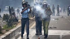 File image of police using teargas to disperse protesters