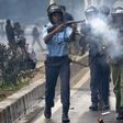 File image of police using teargas to disperse protesters