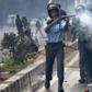 File image of police using teargas to disperse protesters