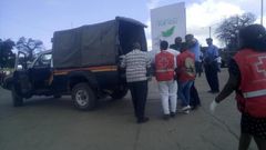 The body of John Mutinda whose car plunged into the Indian Ocean on Saturday, December 7, 2019 being loaded onto a police vehicle