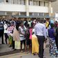 File image of a crowd outside the Regional Immigration offices in Mombasa. Four people who identified themselves as immigration officials, picked Paul Topf from his Lungalunga, Kwale County on November 26