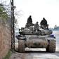 Syrian troops advance through Idlib province towards Saraqeb, a strategic crossroads town long in the sights of government commanders