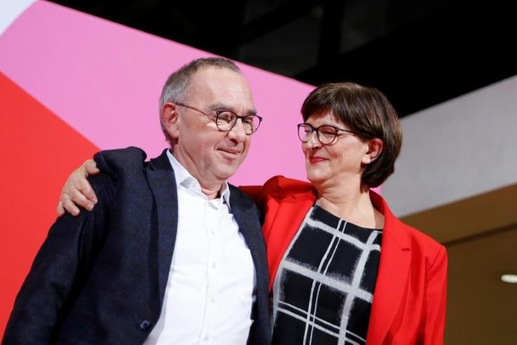 Incoming SPD leaders Norbert Walter-Borjans and Saskia Esken are critical of Merkel's grand right-left coalition