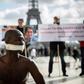 Senegalese artist Alioune Diagne perfoms in Paris  during a gathering in support French-Iranian academic Fariba Abdelkhah and French academic Roland Marchal, detained in Iran