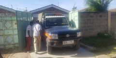 Police collect the body of Sergeant Kipyegon Kenei