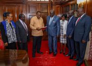 Education CS George Magoha presenting 2019 KCPE Results to President Uhuru Kenyatta.
