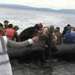 IMAGESMigrants arrive on Lesbos Island from Turkey, after Turkish officials said Ankara would no longer prevent refugees from going to Europe.