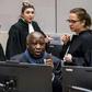 Former Ivory Coast President Laurent Gbagbo (C) has asked the ICC for unconditional release following his acquittal last year