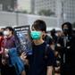 A protester holds a poster during a December 2019 rally in Hong Kong to show support for the Uighur minority in China