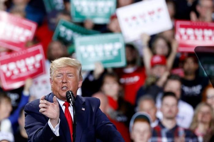 US President Donald Trump ticked off his list of enemies as he addressed supporters in Michigan