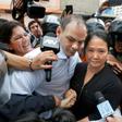 Keiko Fujimori arrives at a Lima courthouse with her husband Mark Villanella on Tuesday