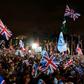 Brexit supporters wave Union flags as they gathered in Parliament Square on January 31, 2020, the day that the UK formally left the European Union