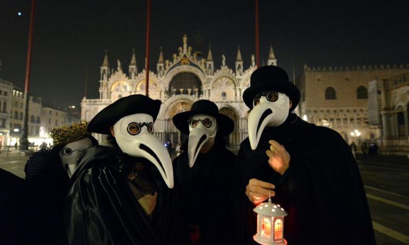 Many wore the plague doctor mask with its long nose, which the physicians wore stuffed with medicinal herbs to protect themselves