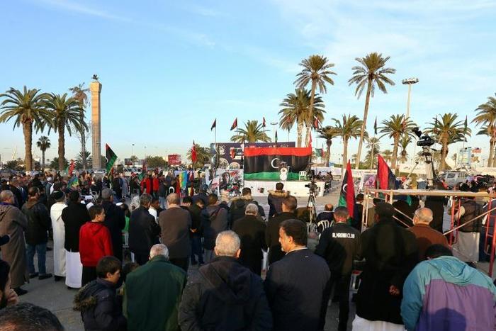 Libyans take part in a demonstration against eastern strongman Khalifa Haftar -- who is backed by France, Russia and others -- and in support of the UN-recognised Government of National Accord (GNA), at Martyrs' Square in the GNA-held capital Tripoli