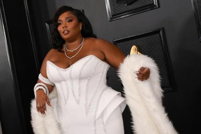US singer-songwriter Lizzo rocks a Versace corset gown at the Grammys