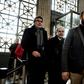 French cardinal Philippe Barbarin, centre, arrived at an appeal hearing in Lyon, France, on Friday to contest his six-month suspended sentence for failing to report sex abuse by a priest.