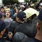 Some 200 people, mostly students, protested in central Algiers on Monday against a presidential election set for December 12