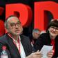 The newly elected co-leaders of Germany's SPD party have been given a mandated to seek more concessions from their CDU coalition partners