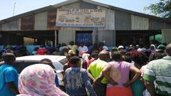 A crowd at the scene where pastor Elijah Misiko of Ground for God’s Gospel 3G Ministries in Mombasa stabbed his wife before committing suicide